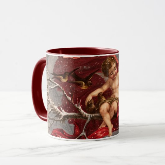 鳥のクリスマスと冬の木の翼のあるケルブ マグカップ (正面左)