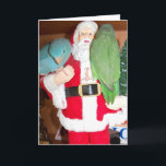 鳥のクリスマスカードとサンタの訪問 シーズンカード<br><div class="desc">この2人のパロットレットはクリスマスだと聞いて、サンタと特別なアポイントメントを組んで、素敵な男の子や女の子のリストに入った。写真は緑と青のパシフィックパロットレットのペアで、サンタと一緒に訪れ、彼らにとって良いおもちゃを見に行く。</div>