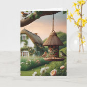 鳥の餌台と鳥の別荘のような自然の風景 カード (黄色い花)