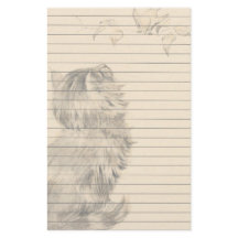 鳥を見ている子ネコ