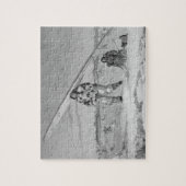 鳥皮のjackeを身に着けているIgloolikのEskimaux ジグソーパズル (縦)