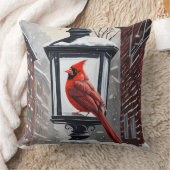 (鳥)ショウジョウコウカンチョウの鳥が雪に覆われた通り灯の上に座った クッション (ブランケット)