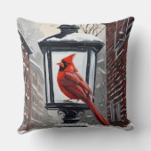 (鳥)ショウジョウコウカンチョウの鳥が雪に覆われた通り灯の上に座った クッション (裏面)