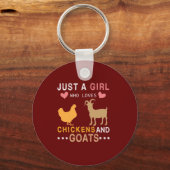 鶏やヤギを愛する女の子にすぎない キーホルダー (正面)
