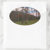 鹿とピンクのサンセットのフィールド 楕円形シール (バッグ)