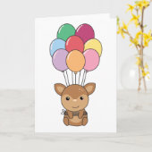 鹿は風船で飛びカラフル上がる カード (黄色い花)