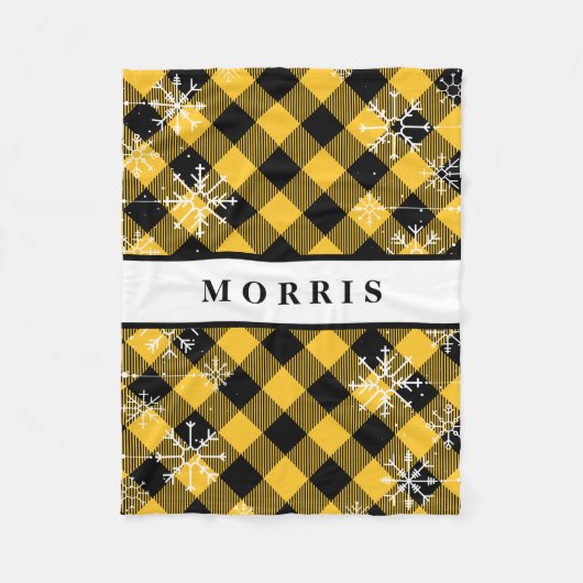 黄と黒の水牛の格子縞の雪片 フリースブランケット (正面)