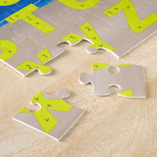 黄色いアルファベットの図表の砂のビーチの海の空のパズル ジグソーパズル (側面)