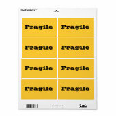 黄色いオレンジ色の壊れやすい移動ラベル ラベル (フルシート)