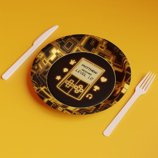 黄色いグローのハンドヘルドコンソール ペーパープレート