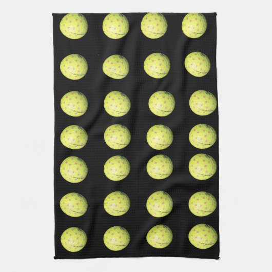 黄色いゴルフボールが黒に キッチンタオル (縦)