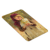 黄色いバターカップの花を持つかわいい少女 マグネット (右側)