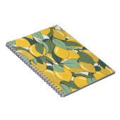 黄色いレモンのトロピカルパターン。 ノートブック (右側)