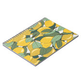 黄色いレモンのトロピカルパターン。 ノートブック (左側)