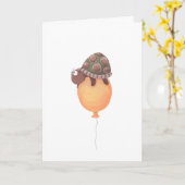 黄色い気球に坐っているおもしろいなカメ カード (黄色い花)