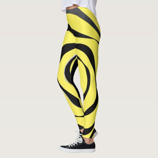 黄色い背景に透明な黒い緩和曲線 レギンス (左)