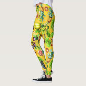 黄色い背景の果実パターン レギンス (左)