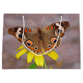 黄色い花の美しい蝶 ラージペーパーバッグ (正面)