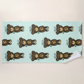 黄色い花を持つかわいい茶色のクマ ビーチタオル (正面)