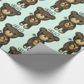 黄色い花を持つかわいい茶色のクマ ラッピングペーパー (角)
