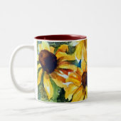 黄色い花黒い目のサザンズ ツートーンマグカップ (左)