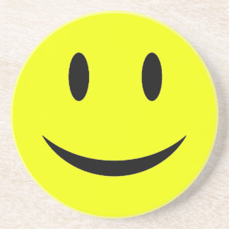 黄色い顔のコースター コースター