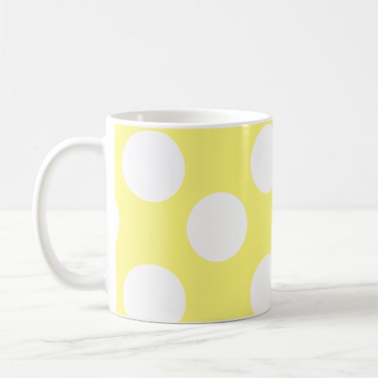 黄色および白く大きい水玉模様のマグ コーヒーマグカップ (左)
