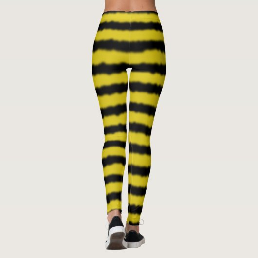 黄色か黒いのまわりに色のストライプのレギンス レギンス (裏面)