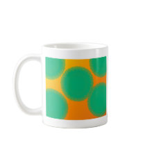 黄色がかったオレンジ色の緑の円