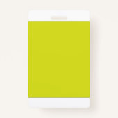 黄色とオレンジの幾何学的な形状が並んでいる バッジ (裏面)