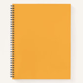 黄色とオレンジ色の色合いが混ざり合って、鮮やかな色彩を作り出す ノートブック (正面)