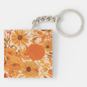 黄色とオレンジ色の花が咲く暖かい秋のフローラ キーホルダー (裏面)