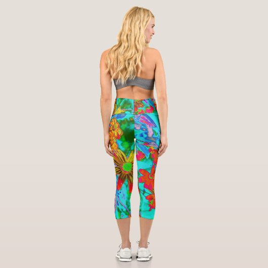 黄色とオレンジ色の花を持つアクアトロピカル カプリレギンス (裏面)