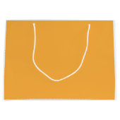 黄色とオレンジ色の調和が、生き生きとした色彩を生み出します ラージペーパーバッグ (正面)