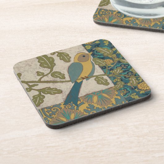 黄色とティール(緑がかった色)の青い鳥が枝に止まる コースター (左側)