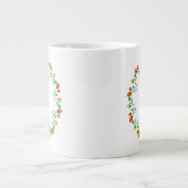 黄色と赤のバラの花を持つフローラの丸い枠 ジャンボコーヒーマグカップ (正面)