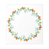 黄色と赤のバラの花を持つフローラの丸い枠 ノートパッド (正面)