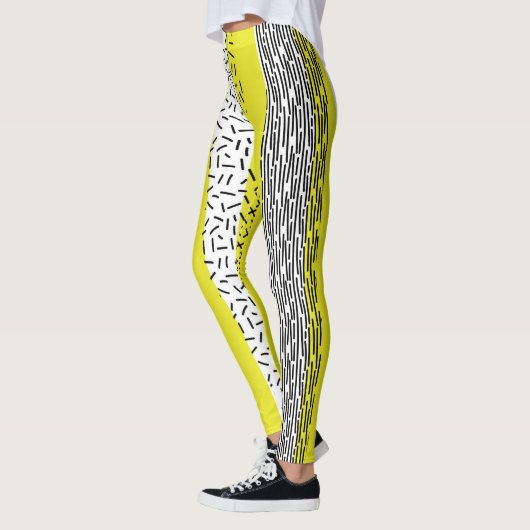 黄色と黒の混合の幾何学的パターン レギンス (左)