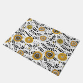 黄色と黒葉のドードルの花と花 ドアマット (アングル)