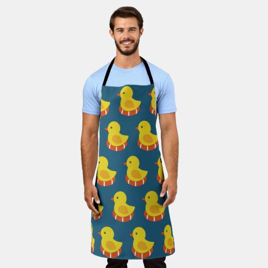 黄色のゴムのアヒルのシームレスなパターン。ヴィンテージ エプロン (着用した状態)