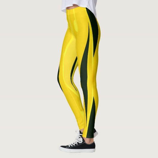 黄色のレギンスと黒い波状のストライプ波形 レギンス (左)