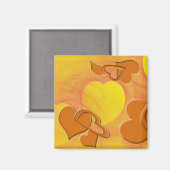 黄色の上に無地の中空オレンジとオレンジのハート マグネット (正面/裏面)