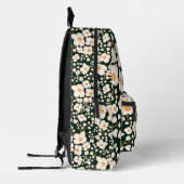 黄色の中央に白い花と緑の背景 プリントバックパック (左)