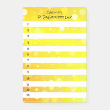 黄色の丸の黒いポストイットのメモ