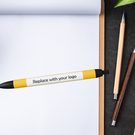 黄色の企業のビジネスロゴ 黒ボールペン