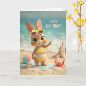 黄色の水着のウサギのビーチの誕生日 カード (黄色い花)