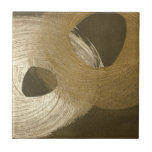 黄褐色と暗褐色の円形の砂嵐 タイル<br><div class="desc">このMegan Meagherの作品には多くの絵画動きが見られる。色の渦巻きは、キャンバスを横切る円形の砂嵐のように見える。これを壁に貼れ！</div>