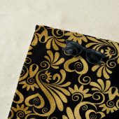 黄金の渦巻きモノグラムの黒 ビーチタオル (インサイチュ)