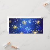 黄金の雪の結晶が付いた青いクリスマス背景 カード (正面/裏面インサイチュ)