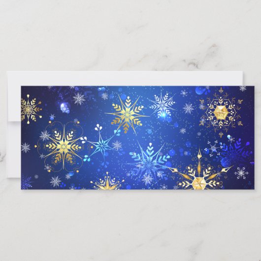 黄金の雪の結晶が付いた青いクリスマス背景 カード (正面)